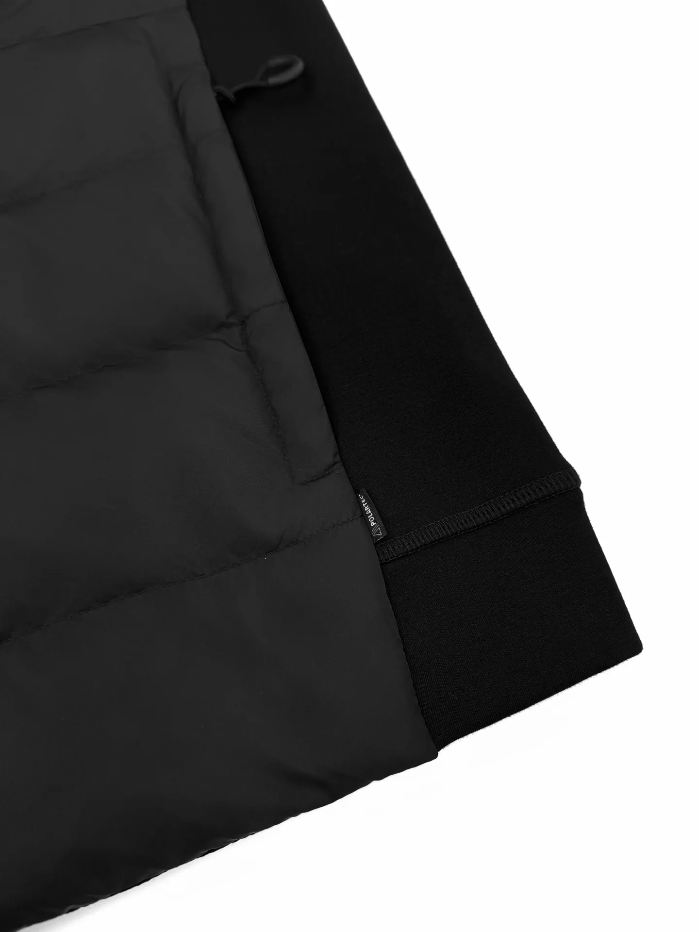 P780 Moncler logo woven splicing down jacket, custom matte lattice air shield down and 300D high-density calendered coating, using the new national standard 90 white duck down (welcome to test), full of down, full of warmth, light and fluffy, with a pure and extreme black tone, exuding an irresistible charm. The Monlcer triangle logo is embellished on the chest. The power aesthetics of the minimalist logo. The concentrated down filling in the front area creates dynamic insulation for the core heat dissipation zone of the human body. The hooded down is a moving warm flow barrier for the head and neck. It forms a thermal energy circulation system with the front panel. The elastic woven sleeves provide freedom of movement with a sense of compression, forming a relaxed and warm philosophy. The real high-end is to let function become the footnote of style. Process 1: Computer mechanical down filling. First, make the liner pattern to determine the filling area and determine the gram weight of down per square meter according to the original three-dimensional effect to calculate the amount of down filling for each piece. The computer down filling machine uses a digital weighing unit. Achieve stable measurement Process 2: 3D three-dimensional quilting technology. With the help of the programming system of the CNC quilting machine, the down in different areas is accurately separated to ensure that the filling is evenly fixed after sewing to avoid agglomeration or shifting. Process 3: Computer template machine line running process. The computer template machine line running process shows extremely high neatness and smoothness. The craftsman accurately controls the size during the operation to ensure that each row line meets the design requirements. The lines of the entire template are smooth and unified, clean and beautiful. Process 4: Triple locking and five-thread dense stitching process. Main seam locking + diagonal reinforcement + raw edge wrapping. Triple structure to form a three-dimensional protective net at the edge of the fabric to avoid stitch breakage. Paving materials: Customized 1:1 Moncler zipper. Customized 1:1 Moncler rope loop. Customized 1:1 Moncler logo. Customized 1:1 Moncler eyelet. Customized 1:1 Moncler trademark. Size: S M L XL Style number: 25378