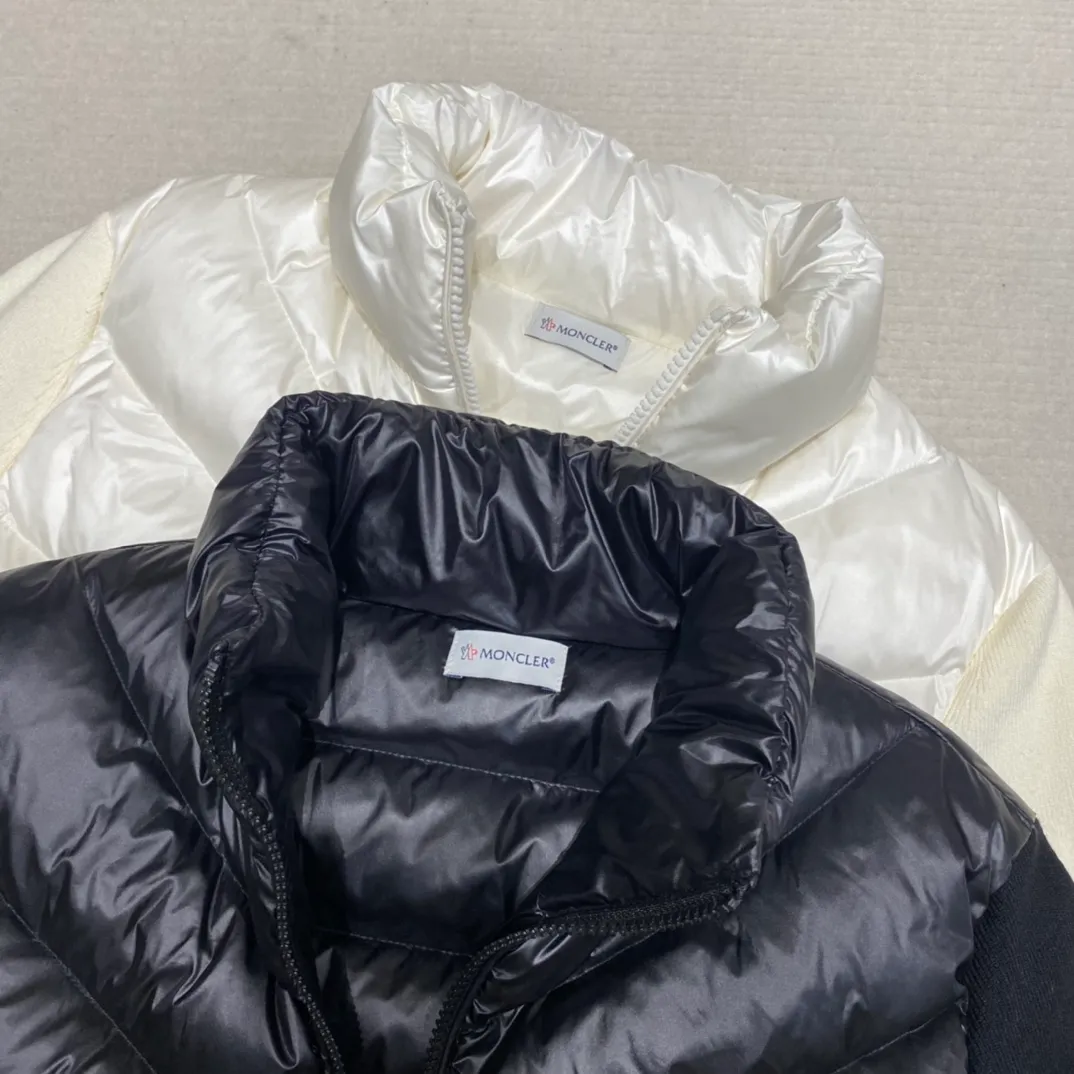 P640 Moncler Women's Stand Collar Knitted Patchwork Down Jacket This padded cardigan is a classic Moncler design piece that can be worn alone or paired with coats and jackets. Lightweight knit style made from soft wool and filled with down on the front and back. Color: black/white Size: 1/2/3/4