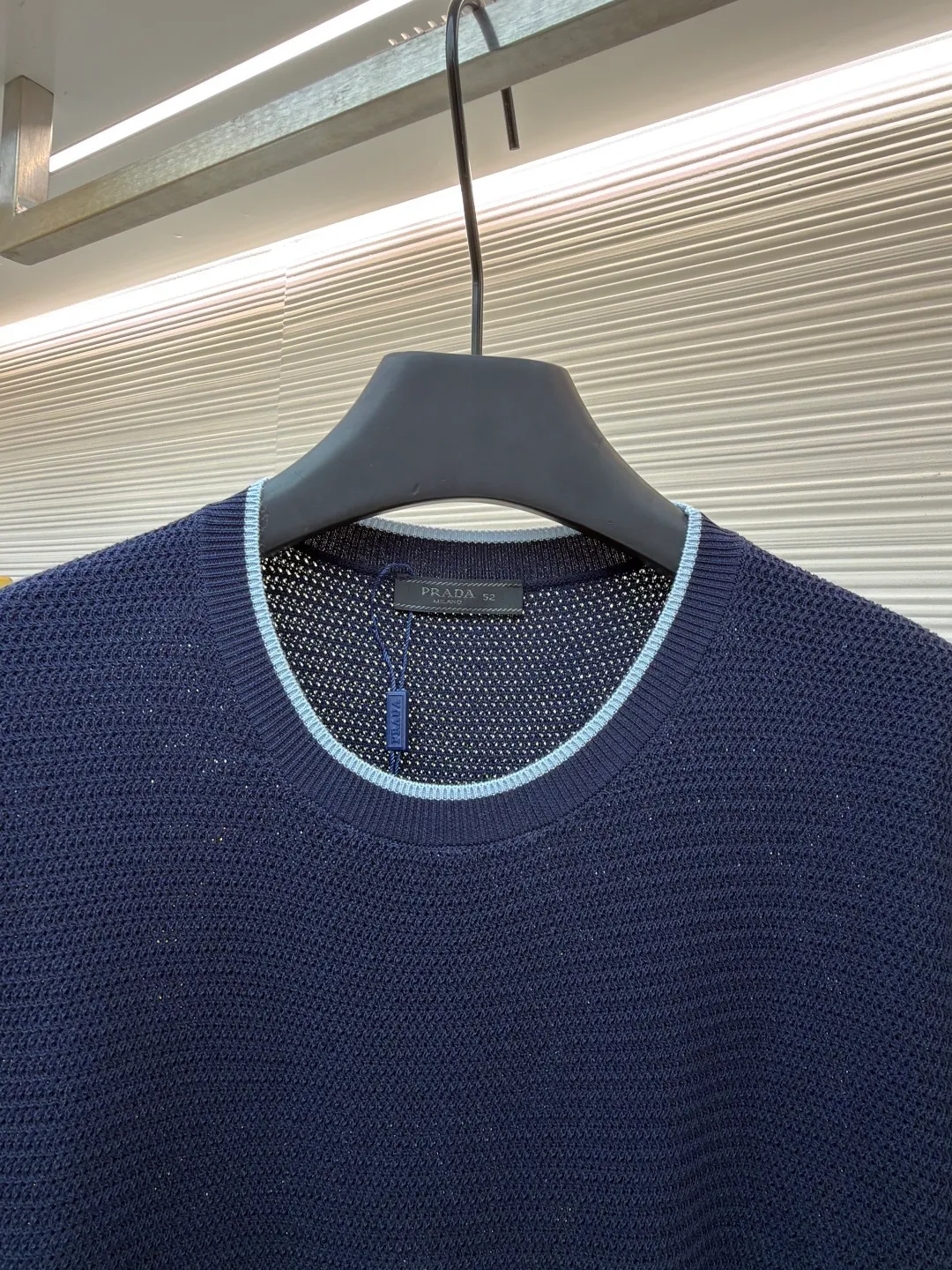 Prada letter logo sweater ●Original version: Purchased and developed for 13800 ●Item number: 1682372-A45 ●Fabric: ice silk wool fabric ●Technology: knitted production ●Color: navy blue ●Version: fitted version ●Weight: about 335 grams ●Size: 48-50-52-54 ●Description: Custom-woven, custom-dyed, luxurious and ultra-fine ice silk wool, soft and silky, comfortable and skin-friendly The main color is deep navy blue, with a touch of smart light blue edges, injecting a sense of agility. The hem of the body is embellished with the Prada letter logo, adding brand recognition. Pure lines are used to outline a simple outline, breaking the monotony in a concise way, showing a luxurious texture in a low-key manner. Imported machine embroidery technology, computer control system and precision mechanical components are used to realize the Prada logo embroidery operation with high precision and smooth and delicate lines. The curved thread structure changes the stitching and yarn arrangement during the knitting process to create a curved distribution of yarns in the fabric. The garment washing water is softened and deodorized. Professional washing equipment and specific detergents are used to deeply clean and deodorize the clothes to improve the feel and appearance of the clothes. The overall wiring is straight and delicate, the fabric is comfortable and soft, and the color is consistent without color difference. It can be matched with the same style to create a fashionable look and control various occasions. Customized accessories, complete with three standards, same style for men and women!