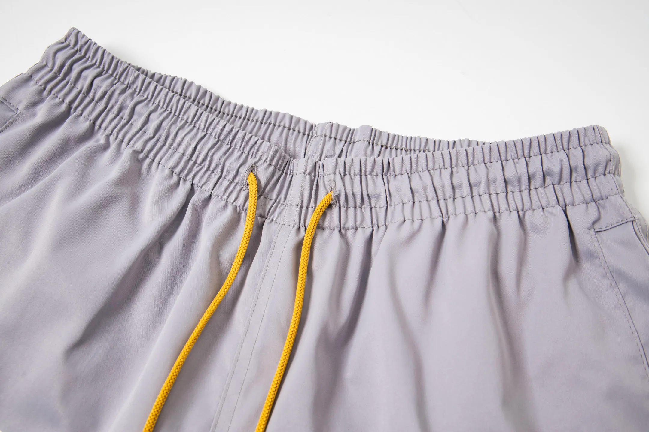 809#P150 Rhude American trendy brand quick-drying beach pants elastic waist shorts letter printed trendy lining mesh men's loose sports pants Color: Black Gray Green Blue Fabric: 150g nylon 100% polyester Size: S M L XL
