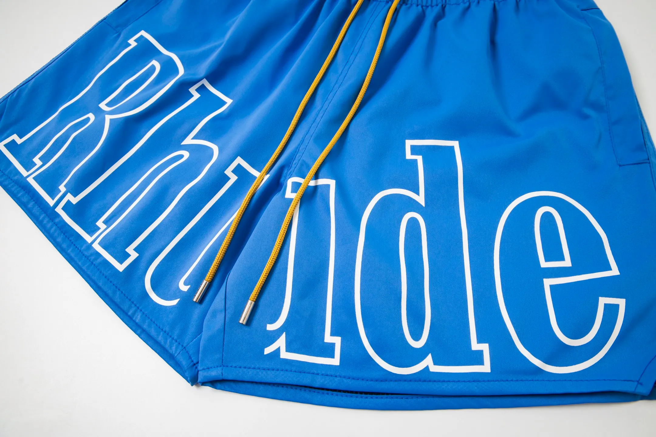 809#P150 Rhude American trendy brand quick-drying beach pants elastic waist shorts letter printed trendy lining mesh men's loose sports pants Color: Black Gray Green Blue Fabric: 150g nylon 100% polyester Size: S M L XL