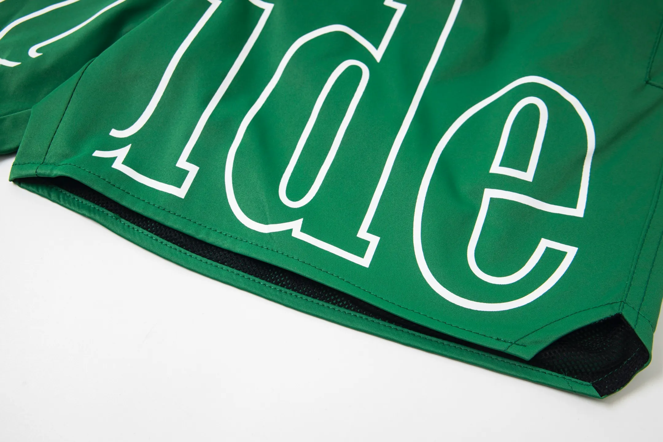 809#P150 Rhude American trendy brand quick-drying beach pants elastic waist shorts letter printed trendy lining mesh men's loose sports pants Color: Black Gray Green Blue Fabric: 150g nylon 100% polyester Size: S M L XL