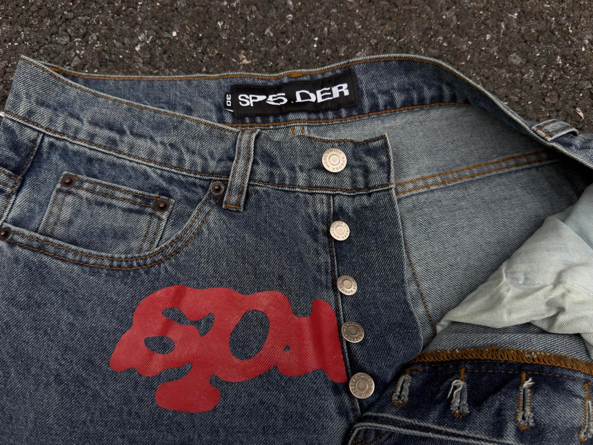P210 (original outdoor picture direct) top version Sp10der street fashion brand printed washed and distressed casual jeans for men and women, same style. Size: 28 30 32 34 36
