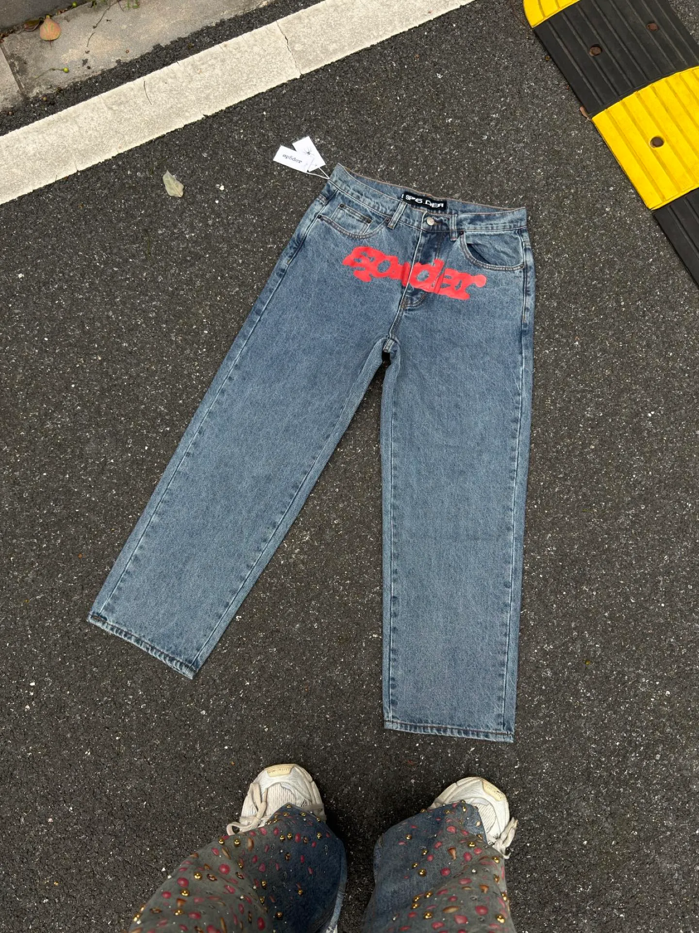 P210 (original outdoor picture direct) top version Sp10der street fashion brand printed washed and distressed casual jeans for men and women, same style. Size: 28 30 32 34 36
