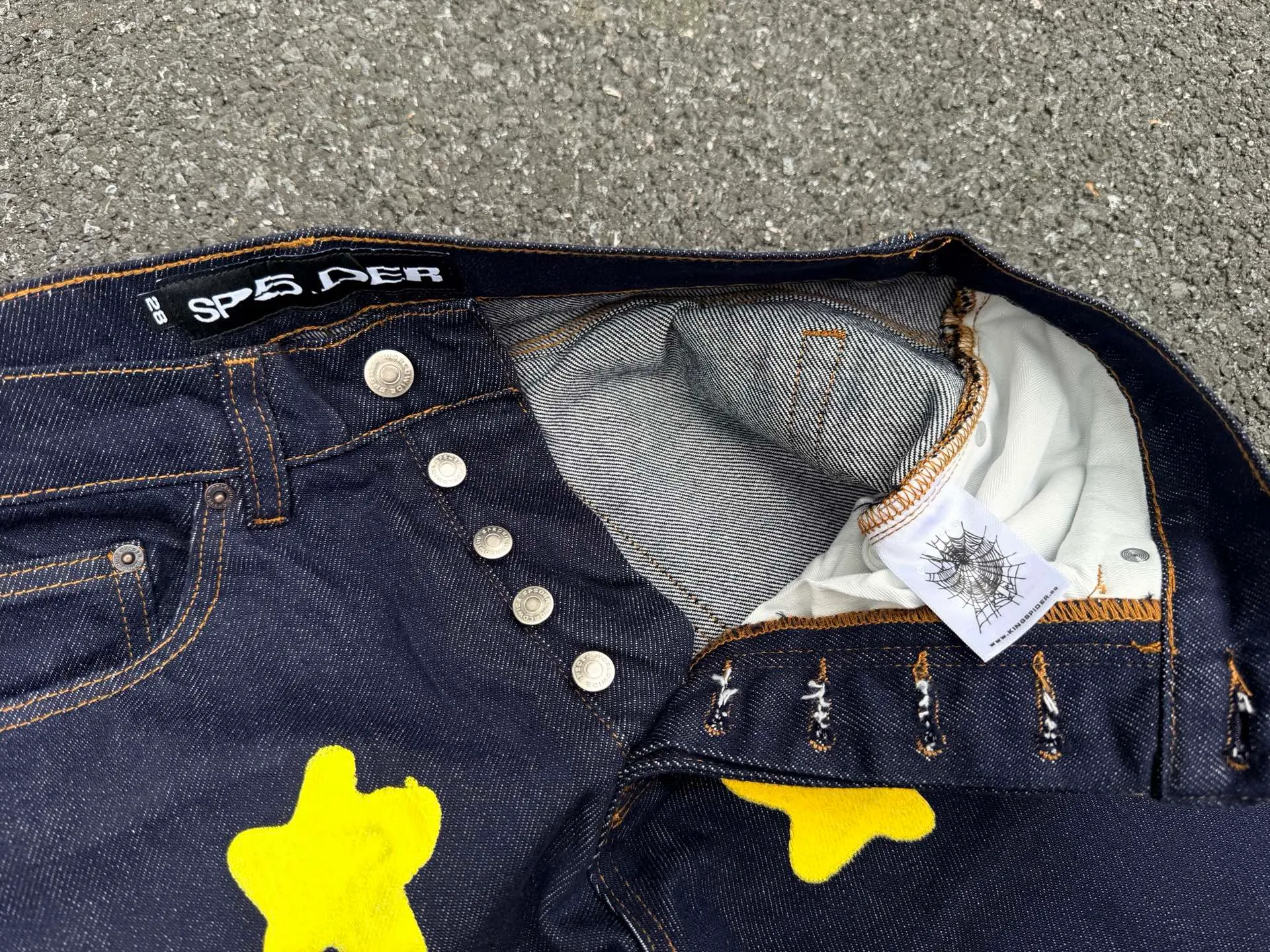 -Size details P250 (original outdoor picture direct) top version Sp10der street fashion brand foam printed big star washed and distressed casual jeans for men and women color: raw cow color code number: 28 30 32 34 36
