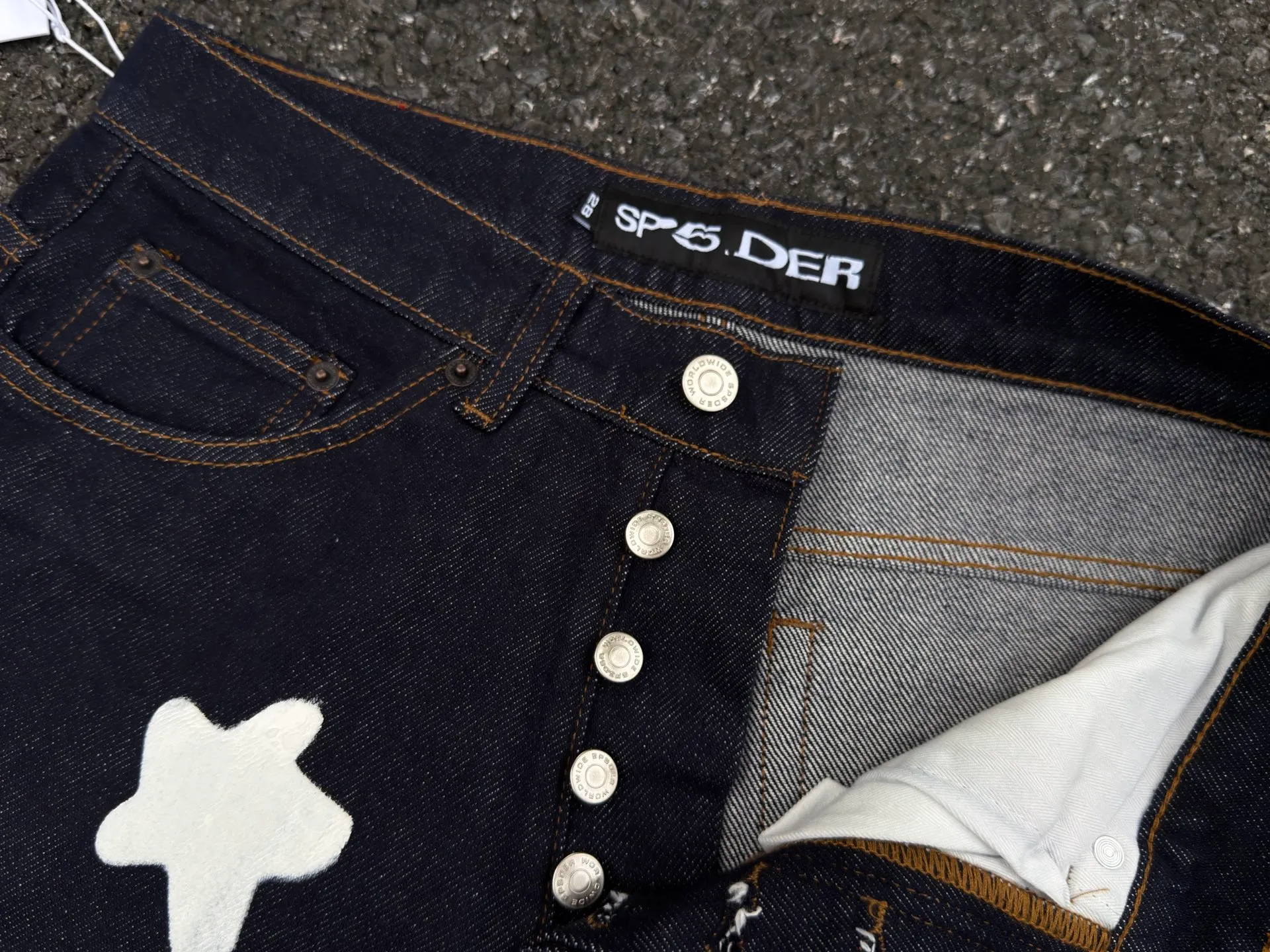 -Size details P250 (original outdoor picture direct) top version Sp10der street fashion brand foam printed big star washed and distressed casual jeans for men and women color: raw cow color code number: 28 30 32 34 36