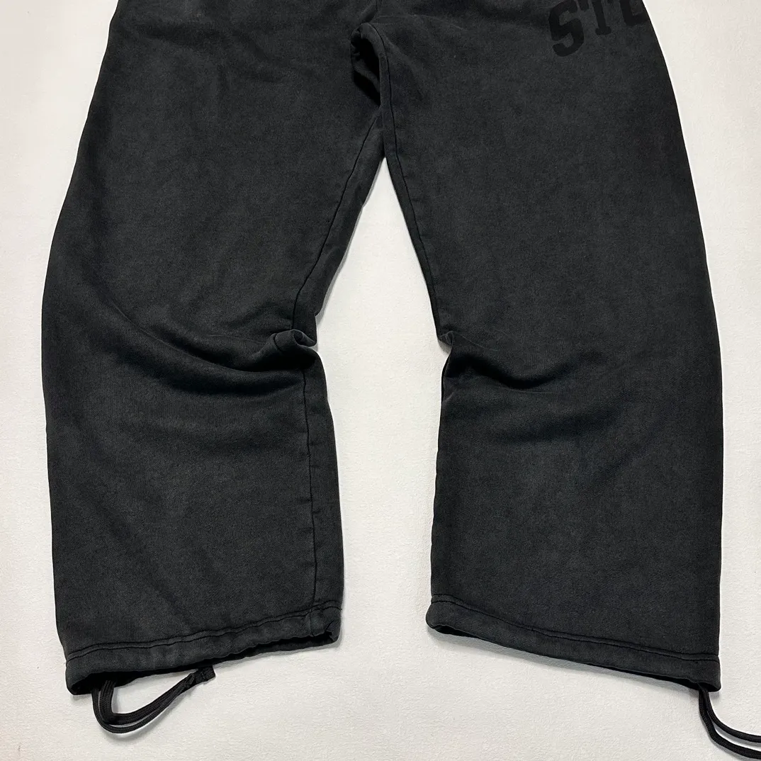 Details Washed sweatpants STUSSY FW24 FLEECE PANT FADED GRAPHIC Loose velvet sweatpants with logo on the side, washed black S- XL