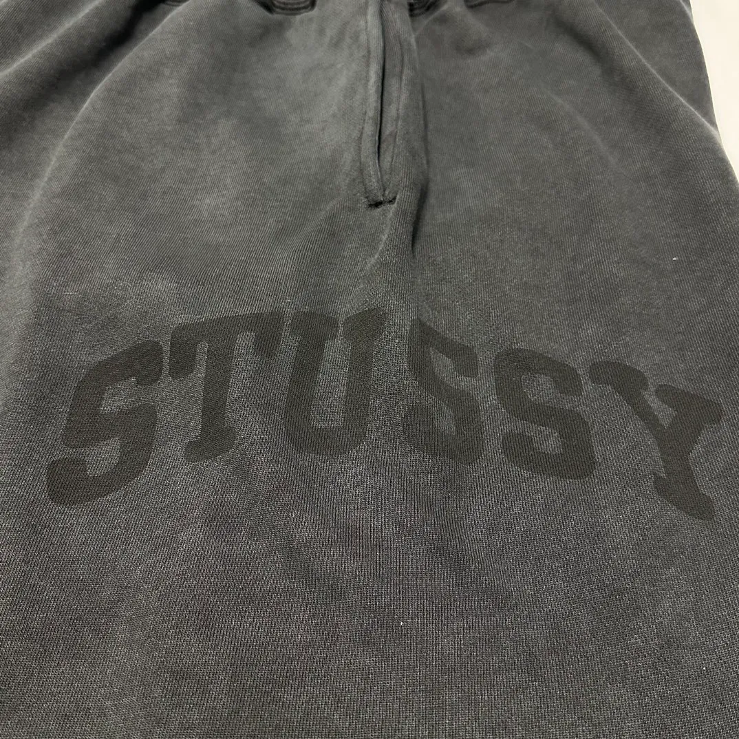 Details Washed sweatpants STUSSY FW24 FLEECE PANT FADED GRAPHIC Loose velvet sweatpants with logo on the side, washed black S- XL