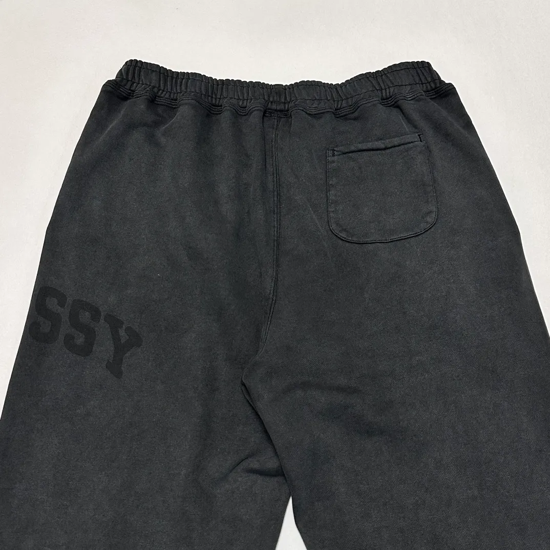 Details Washed sweatpants STUSSY FW24 FLEECE PANT FADED GRAPHIC Loose velvet sweatpants with logo on the side, washed black S- XL