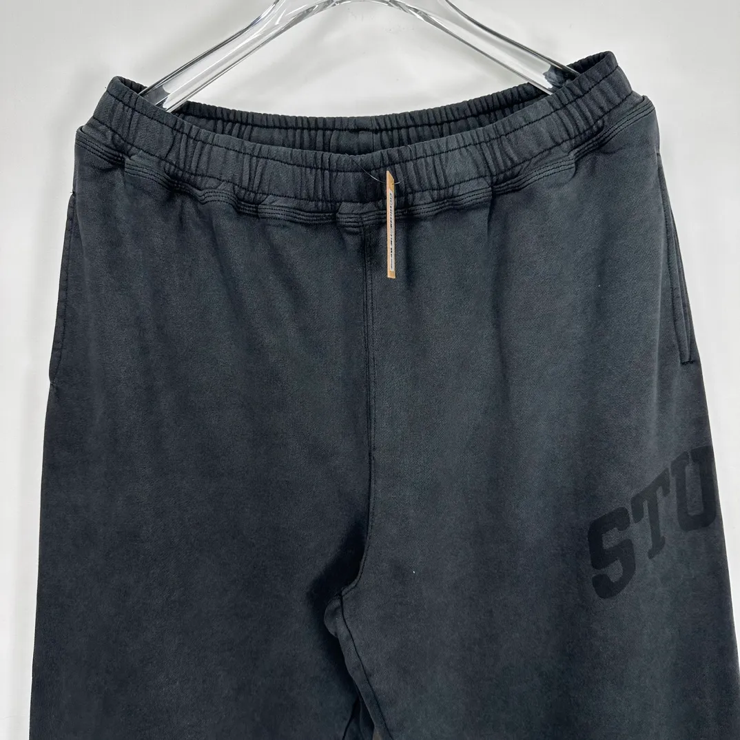 Washed sweatpants STUSSY FW24 FLEECE PANT FADED GRAPHIC loose thin velvet sweatpants with logo on the side, washed black S- XL