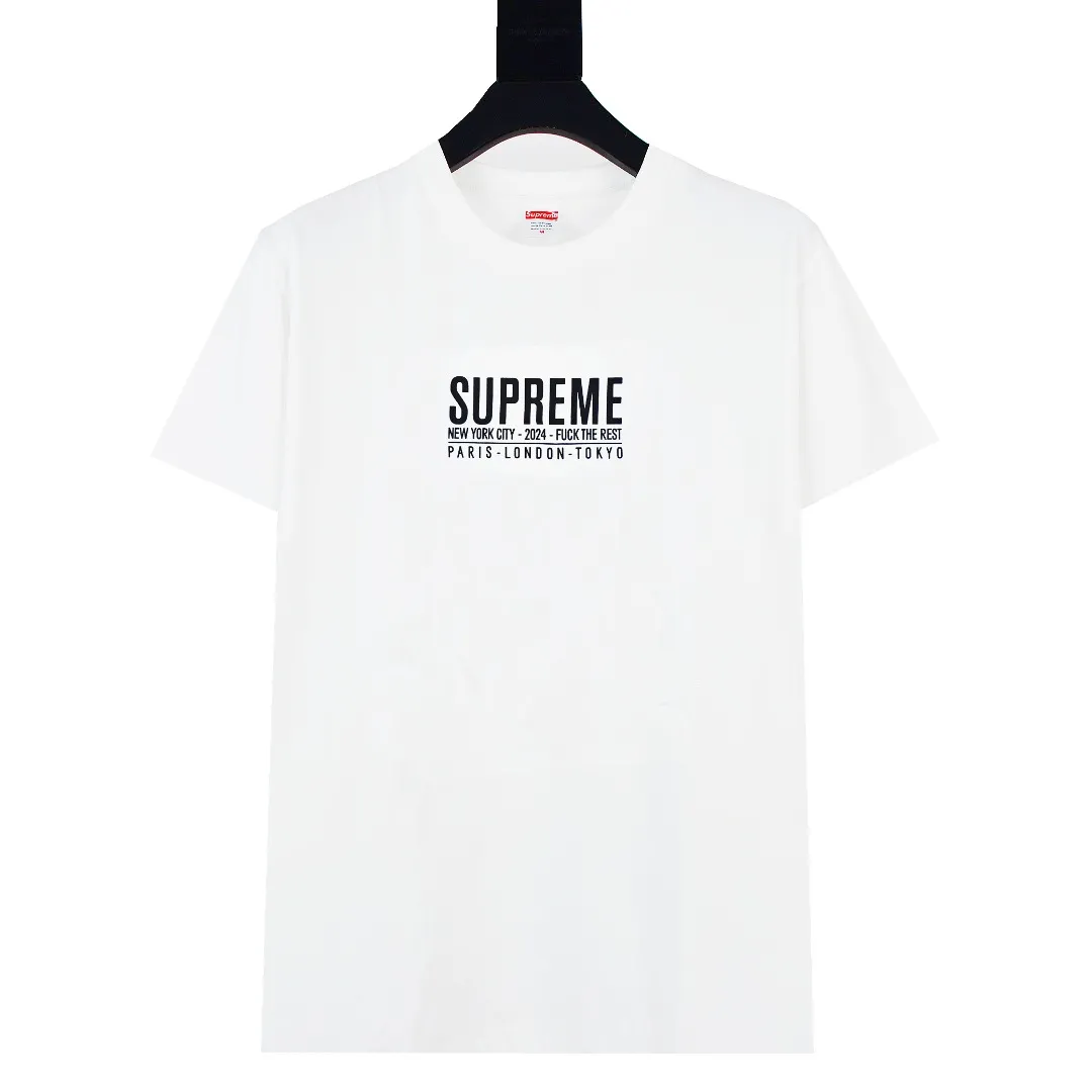 S384💰p136 Top version Supreme 24ss Paris PARIS short-sleeved T-shirt. Refuse to look at pictures to make goods. Refuse to compare wrong versions. Use cylinder seamless process (original process, there are no stitched bones on the side of the clothes, the key point of identification) The fabrics are all custom-woven and dyed, 280g weight, 100% cotton, cylindrical fabric. Cylindrical fabric is a knitted fabric woven with a cylinder loom. The needles are distributed in a cylindrical shape on the fuselage. The gray fabric is a large cylinder, which needs to be opened and shaped before it can be used further. There are no slits on the side of the clothes, so there is no washing label on the side of ordinary short-sleeves. There is only one collar label behind the neck. The printing uses thermosetting ink printing imported from Belgium (different from conventional heat transfer printing), also known as plastic ink, or self-adhesive ink. Its ingredients are: mainly composed of polyvinyl chloride (PVC) and phthalates. PVC and phthalates, solid color The thermosetting ink is composed of a mixture of agents, stabilizers, and thickeners. It is not the digital direct printing marketed on the market. The printing texture of thermosetting ink cannot be achieved by digital direct printing. The collar label has a watermark anti-counterfeiting effect, a real anti-counterfeiting layer, a version with a high probability of passing the inspection, and the original packaging picture has a high probability of passing the test. Size：S-XL