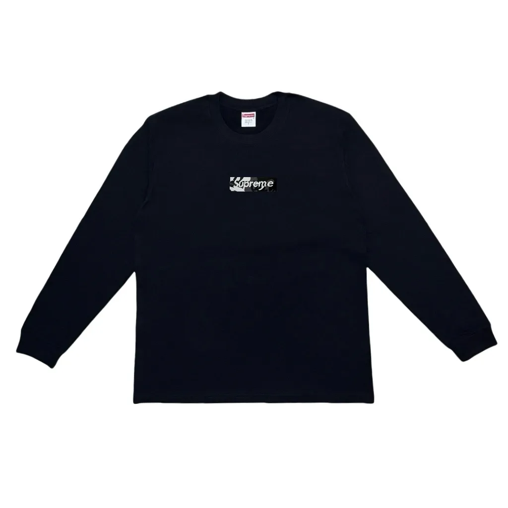 P140 Supreme Week 16 x Emilio Pucci joint model Box Logo Tee Logo printed solid color long-sleeved T-shirt, same style for men and women, using cylindrical seamless technology (original technology, there are no stitched bones on the side of the clothes, key points for identification) Fabric: All custom-woven and dyed, 280g weight, 100% cotton, cylindrical fabric. Cylindrical fabric is a knitted fabric woven with a cylinder loom. The needles are distributed in a cylindrical shape on the fuselage. The gray fabric is a large cylinder. It needs to be opened and shaped before further use. There is no slit on the side of the clothes, so there is no washing label on the side of ordinary short-sleeved clothes. There is only one collar label behind the neck, so the shape is very correct and not easy to deform (color: black and white)