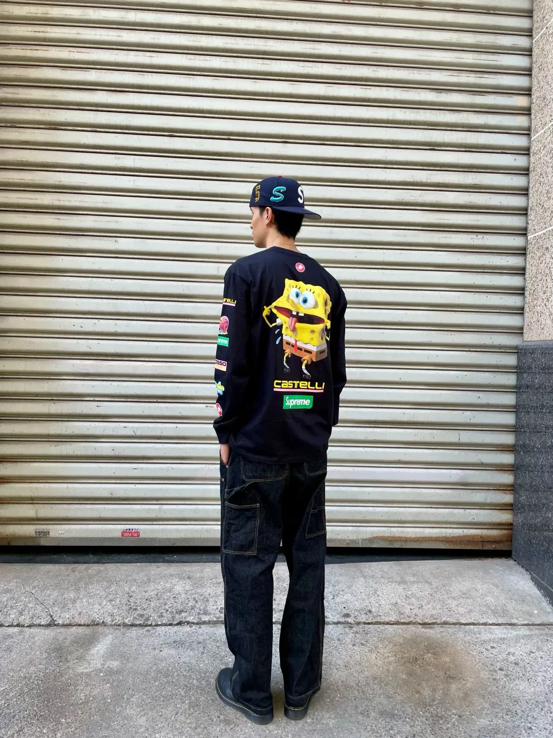 S626💰p270 Supreme x SPONGEBOB SQUAREPANTS Spongebob x CASTELLI joint model SS25 WEEK11 Racing L/S Tee SpongeBob SquarePants funny printed pattern round neck long-sleeved T-shirt Unisex 260g pure cotton material Super cute large print Very popular appearance Color: Black White Size: S M L XL (175 140 wear M) Length: 69 71 73 76 Bust: 114 118 122 126 Sleeve length: 62 63 64 65