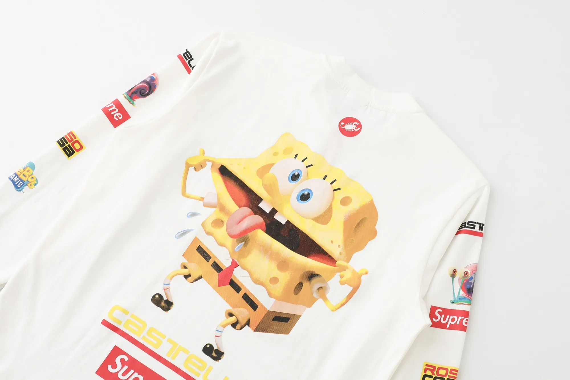S626💰p270 Supreme x SPONGEBOB SQUAREPANTS Spongebob x CASTELLI joint model SS25 WEEK11 Racing L/S Tee SpongeBob SquarePants funny printed pattern round neck long-sleeved T-shirt Unisex 260g pure cotton material Super cute large print Very popular appearance Color: Black White Size: S M L XL (175 140 wear M) Length: 69 71 73 76 Bust: 114 118 122 126 Sleeve length: 62 63 64 65