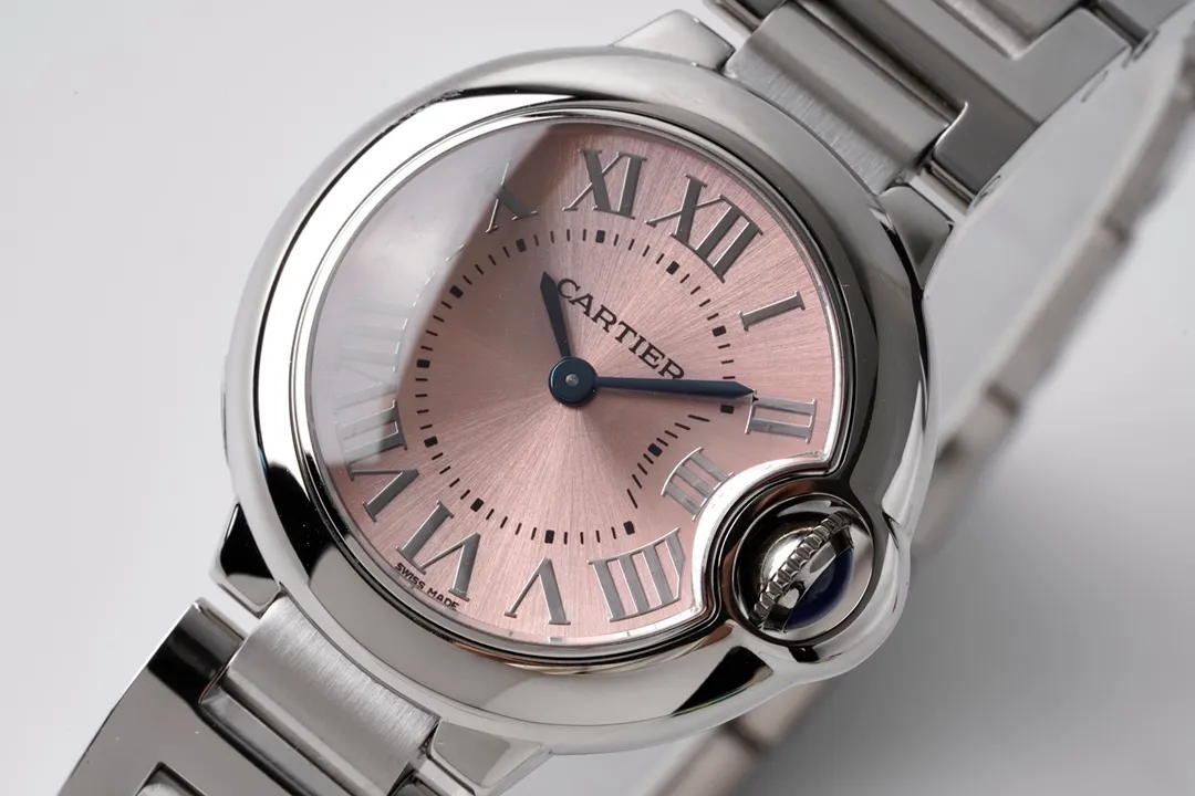 AF's most beautiful replica Cartier 28mm small blue balloon W6920038 ladies watch! The best one to one reproduction! Extremely exquisite and full of authentic charm! It is a super replica that is difficult to tell whether it is authentic or fake without removing the back cover! AF at all costs! Upgrade and optimize! It adopts Swiss Ronda's ""Special Customized Quartz Movement"" and changes the size of the needle axis! This allows the original needle to be shared! The appearance is exactly the same as the original product! It is not a fake at first glance from other manufacturers in the market! Refined case and strap! The crown is inlaid with an original spinel, which is absolutely beautiful at the original factory level. Pink dial, Roman numerals, original sword-shaped blue steel hands, sapphire fish-eye water drop mirror, exquisite crescent mouth! The details are incomparable! At the same time, it has upgraded to a new original authentic tag with one size! No matter the price! The appearance is good! There are not many copies of the same model on the market! First come first!
