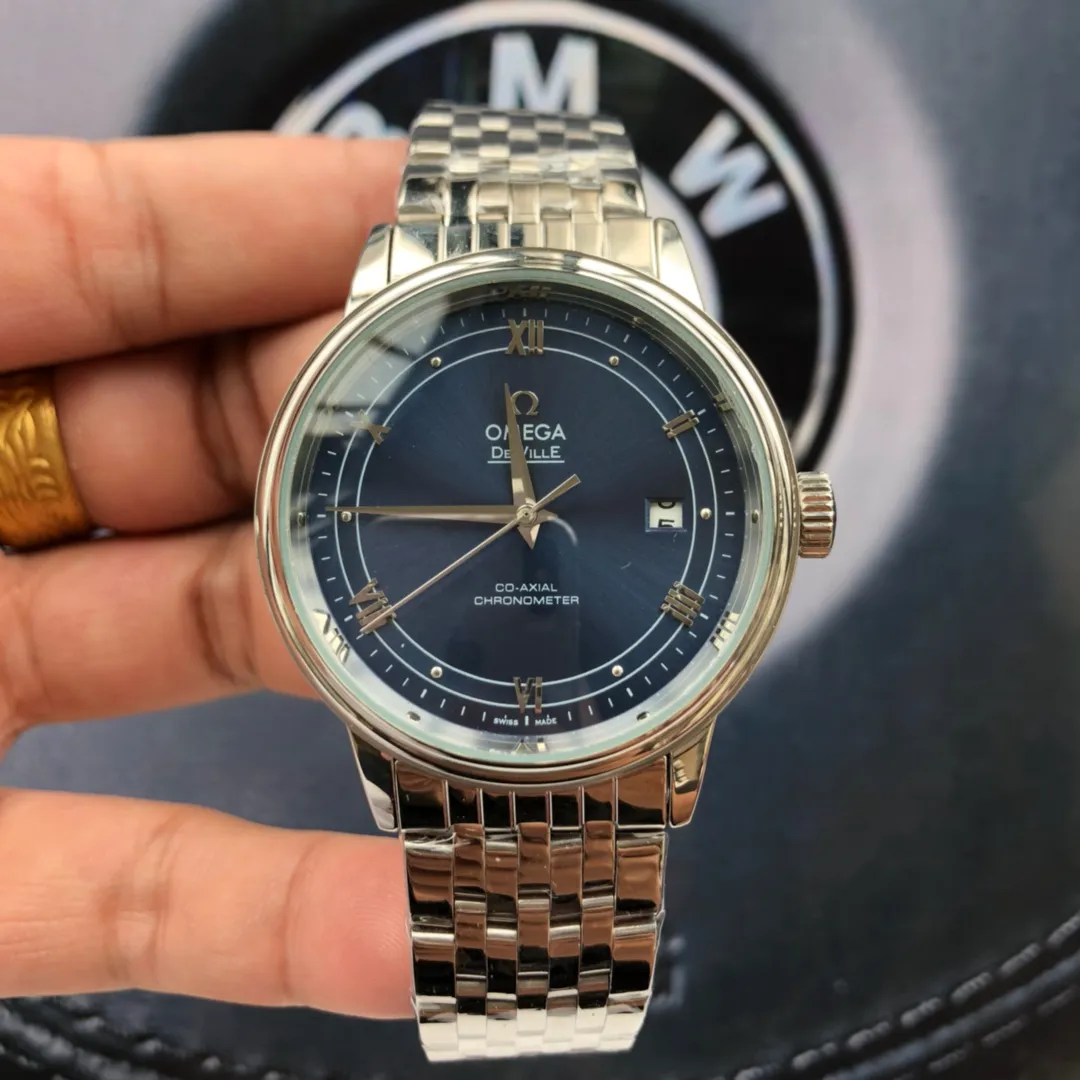 [High-end replica] 💰910 Omega De Ville men's watch, the king of sales champions🏆, with complete colors, accurate travel time, long-lasting and durable, and highly recognized by watch friends [Case] 316L stainless steel case, modified and beautiful body, imported movement (accurate and stable travel time), original consistent 39.5mm diameter, curved dial, deep waterproof, 316L stainless steel bracelet with original folding clasp of the same material Or calfskin strap optional ⚠️Please look for products produced by HS, the best products are constantly available